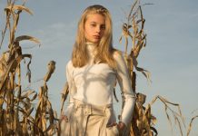 The Key Pieces to Wear This Season Young woman in a beige outfit stands in a cornfield