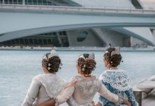 After-Dark Style: What to Wear to a Night Out This Season a group of three women standing next to each other