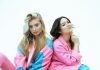 Polished, Not Overdone: The Easy Way to Dress Up Two young women posing playfully in colorful outfits.